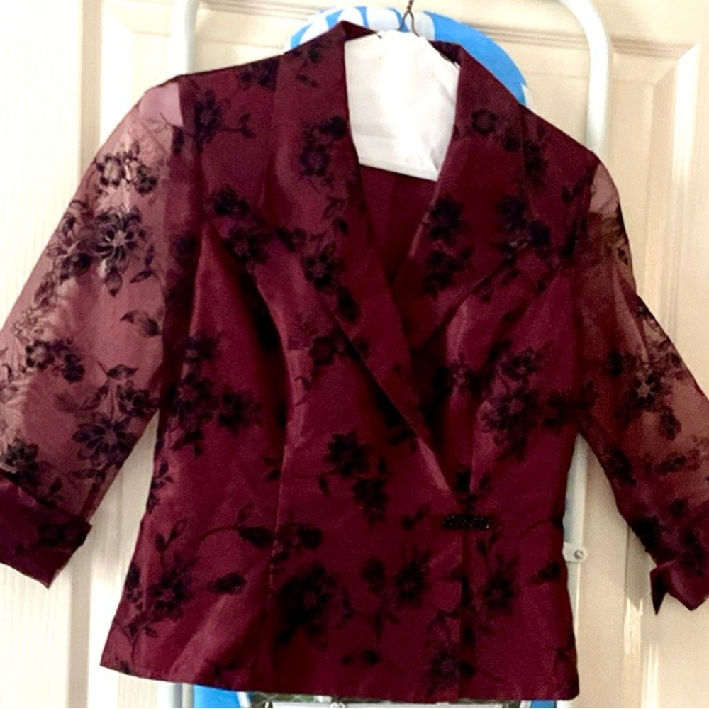 Beautiful silk appliquéd women’s top. Worn once. Size small/medium.